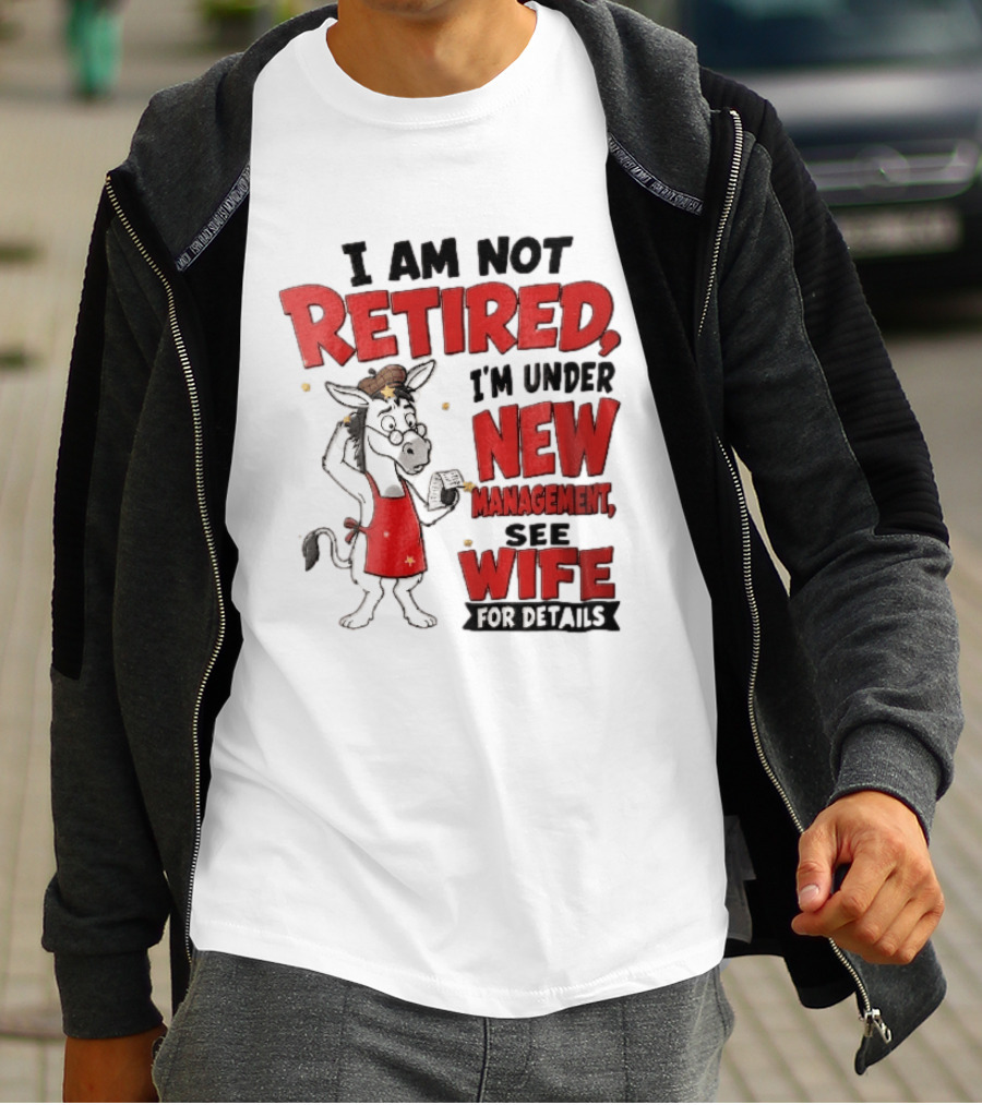I Am Not Retired I'm Under New Management See Wife For Details Cartoon Donkey Red Apron T-Shirt