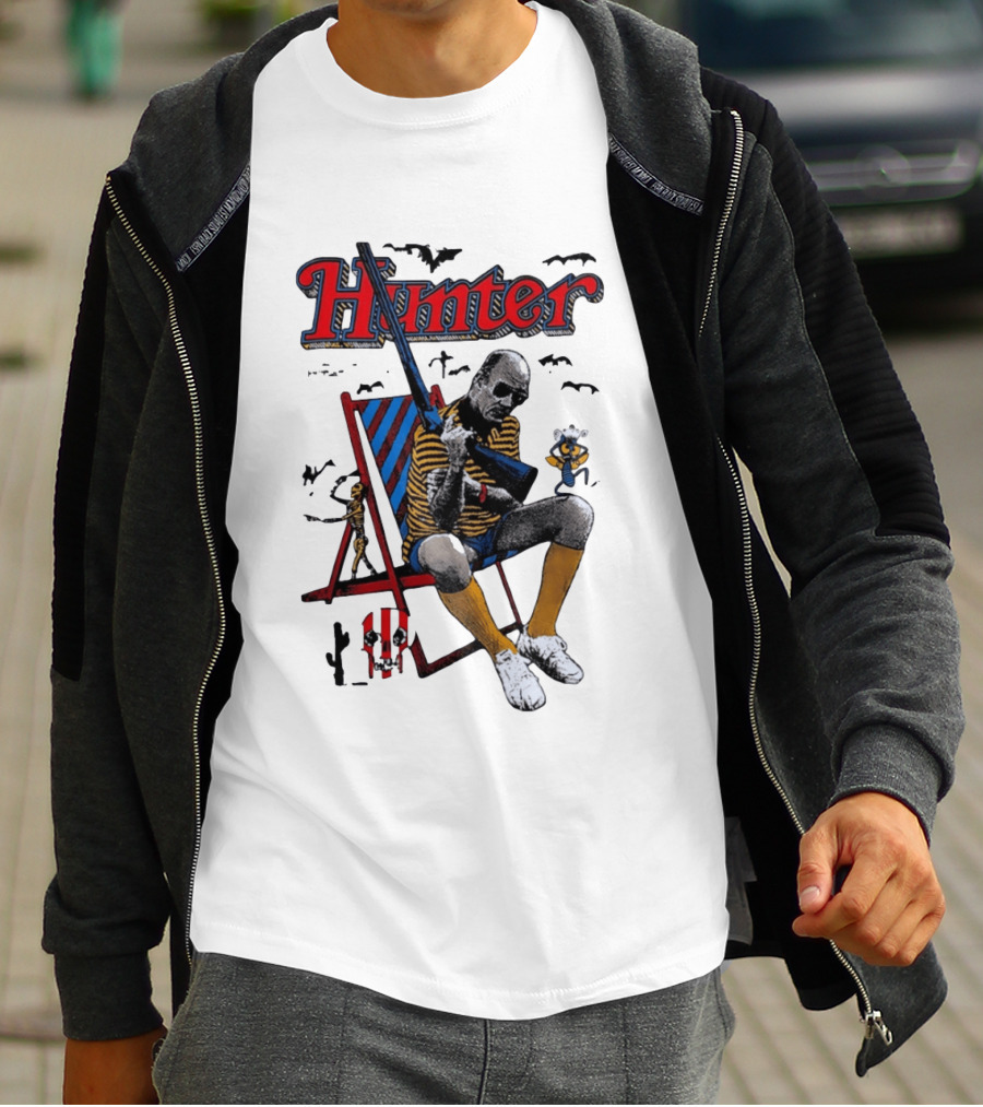 Hunter July 18 1937 February 20 2005 Man Holding Rifle Striped Chair Yellow Socks T-Shirt