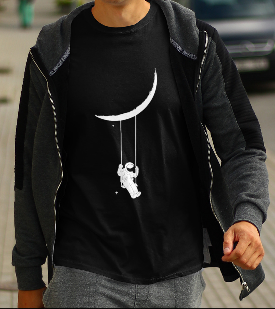 Astronaut Swinging On Crescent Moon Space Scene T-Shirt
