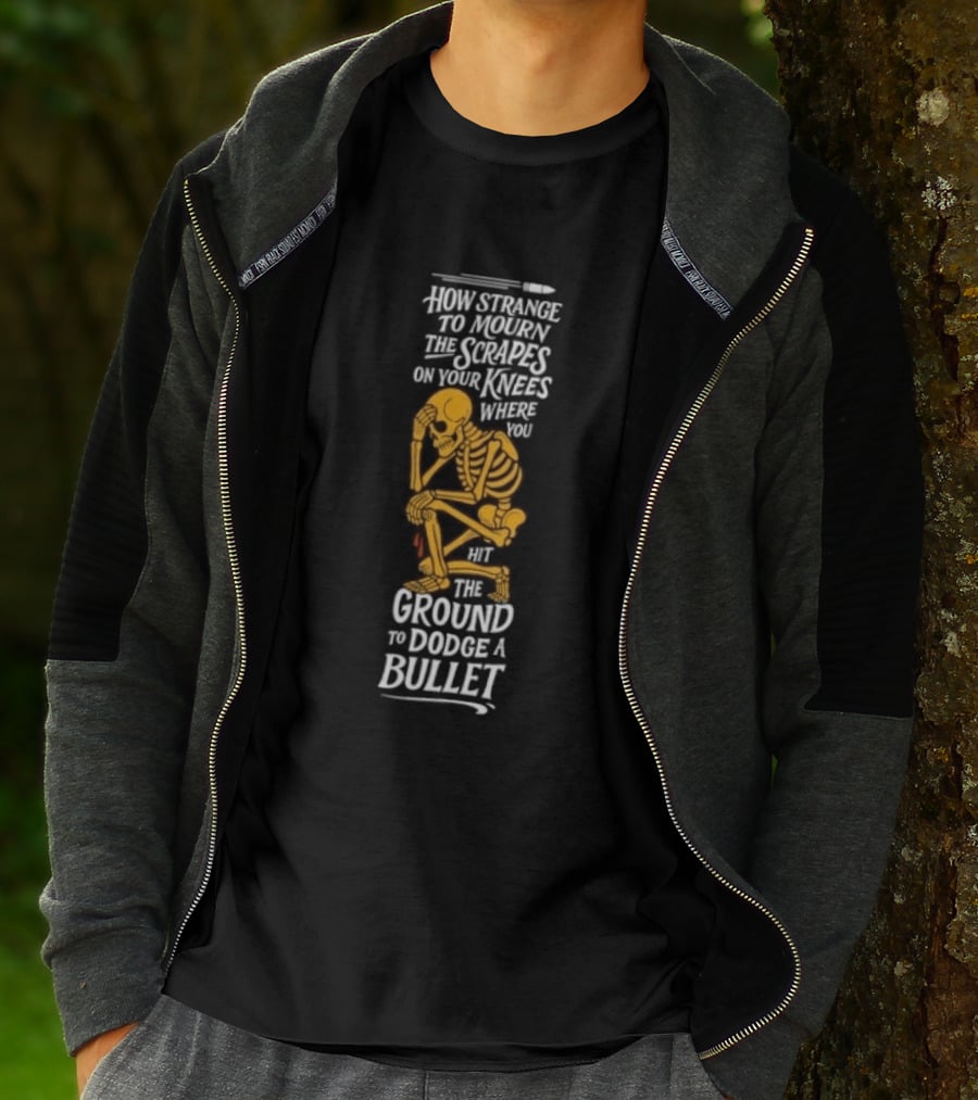 How Strange To Mourn The Scrapes On Your Knees Skeleton Embrace The Ground To Dodge A Bullet T-Shirt