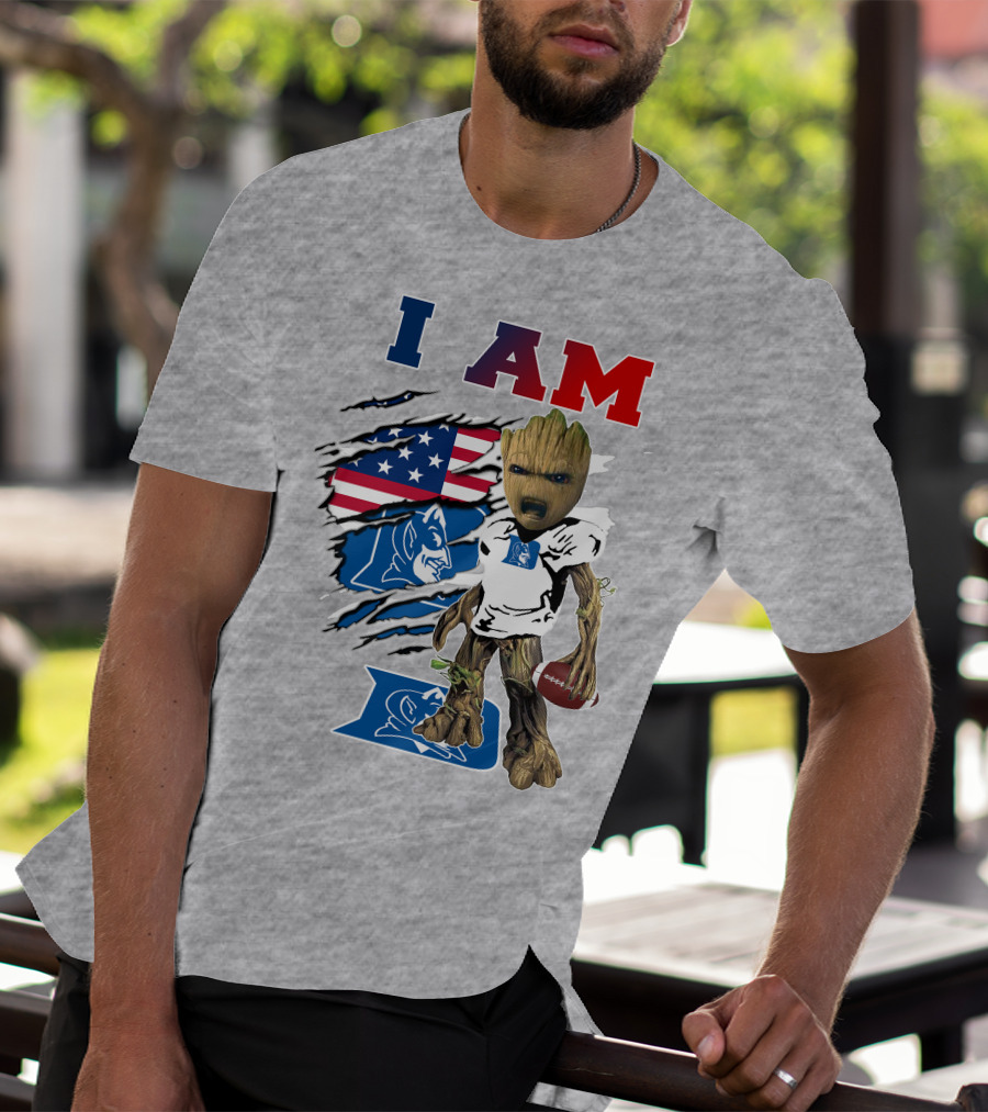 I AM Duke Baby Groot With American Football And Flag Background T-Shirt
