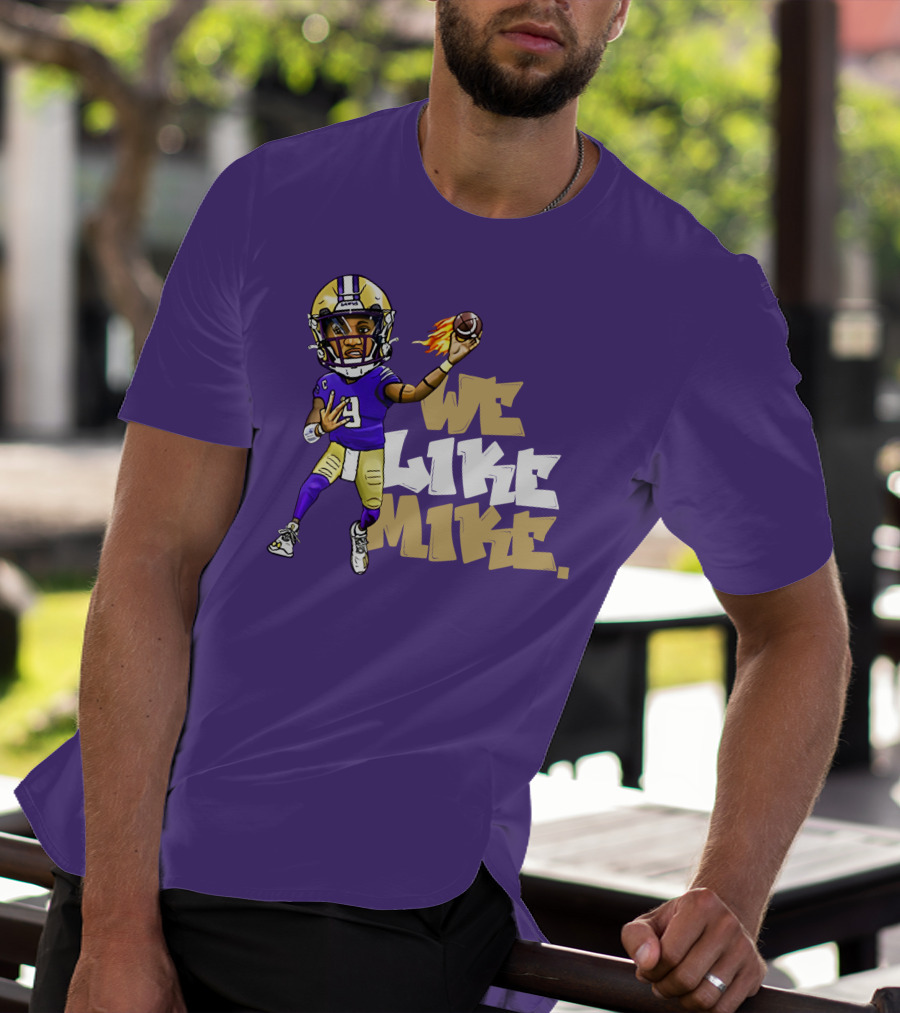 We Like Mike Football Character In Purple And Gold Gear Holding Flaming Ball T-Shirt