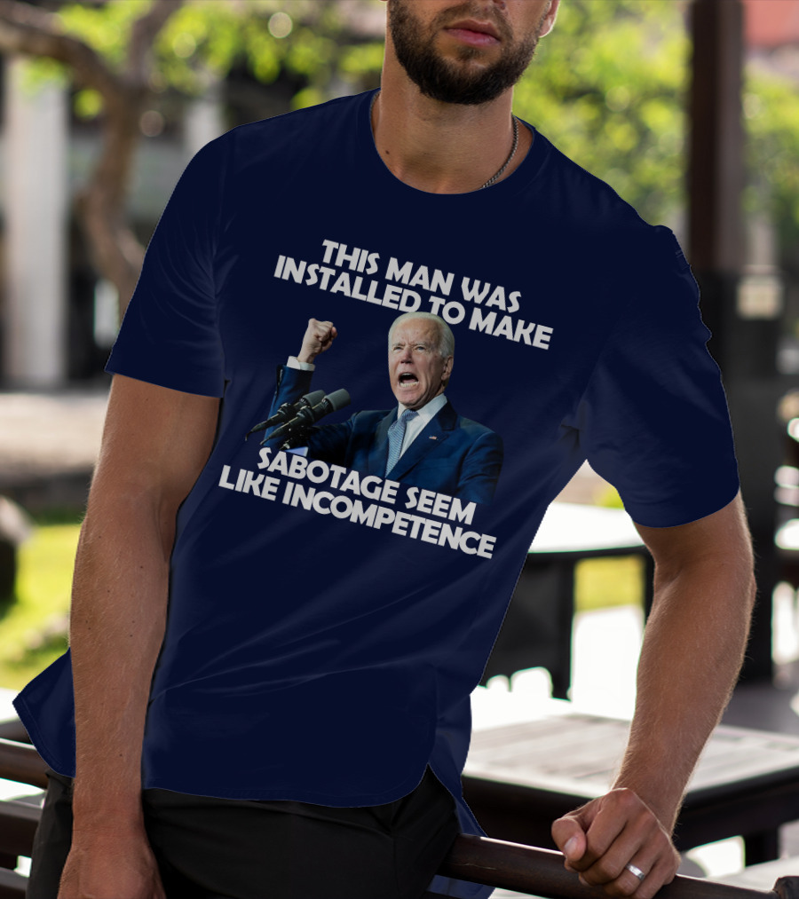 This Man Was Installed To Make Sabotage Seem Like Incompetence Fist Raised With Microphones T-Shirt
