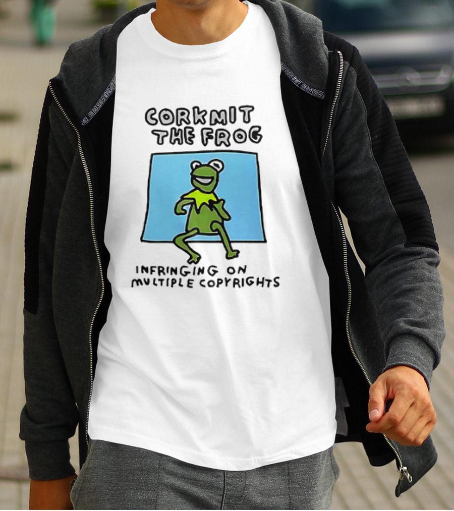 Corkmit The Frog Infringing On Multiple Copyrights Green Frog Cartoon With Blue Background T-Shirt