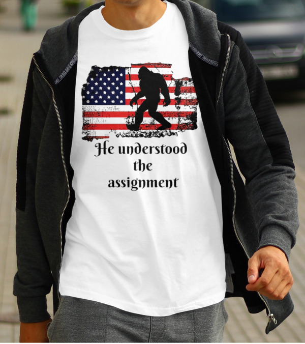 Bigfoot Silhouette With Distressed American Flag He Understood The Assignment T-Shirt