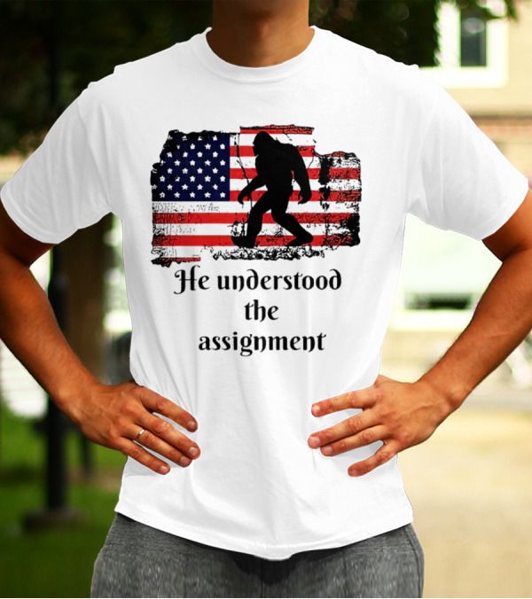 Bigfoot Silhouette With Distressed American Flag He Understood The Assignment T-Shirt