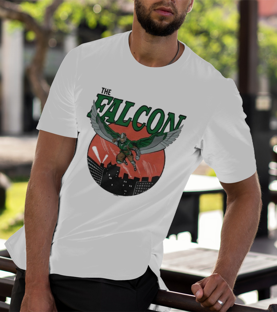 The Falcon Soaring Over City Skyline In Action-Packed Comic T-Shirt