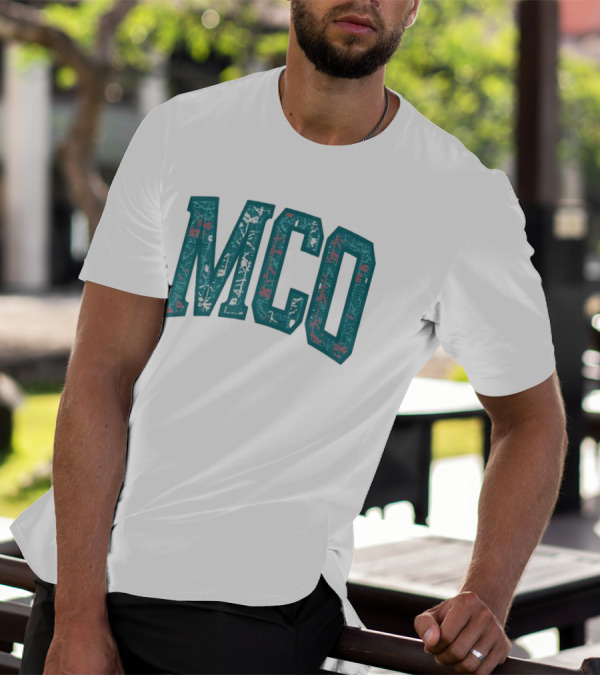 MCO Magic Carpet Oasis Vintage Teal Textured Letters T-Shirt