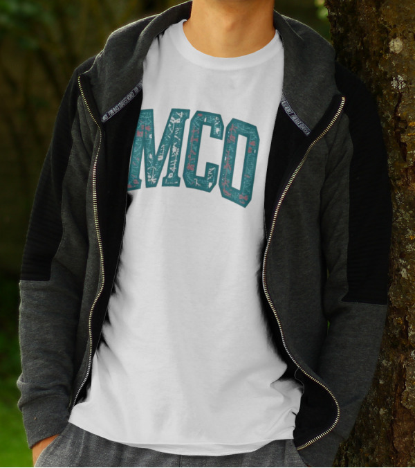 MCO Magic Carpet Oasis Vintage Teal Textured Letters T-Shirt