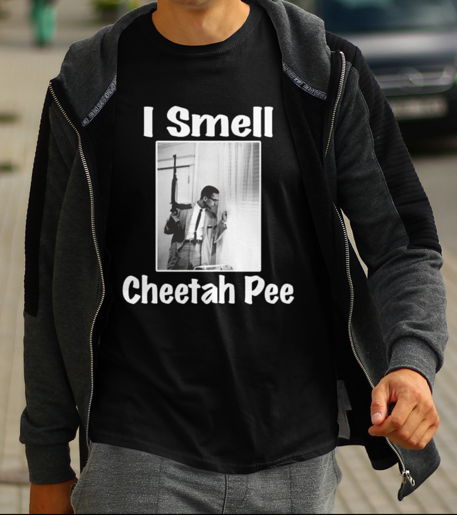I Smell Cheetah Pee Man Holding Gun By Window T-Shirt