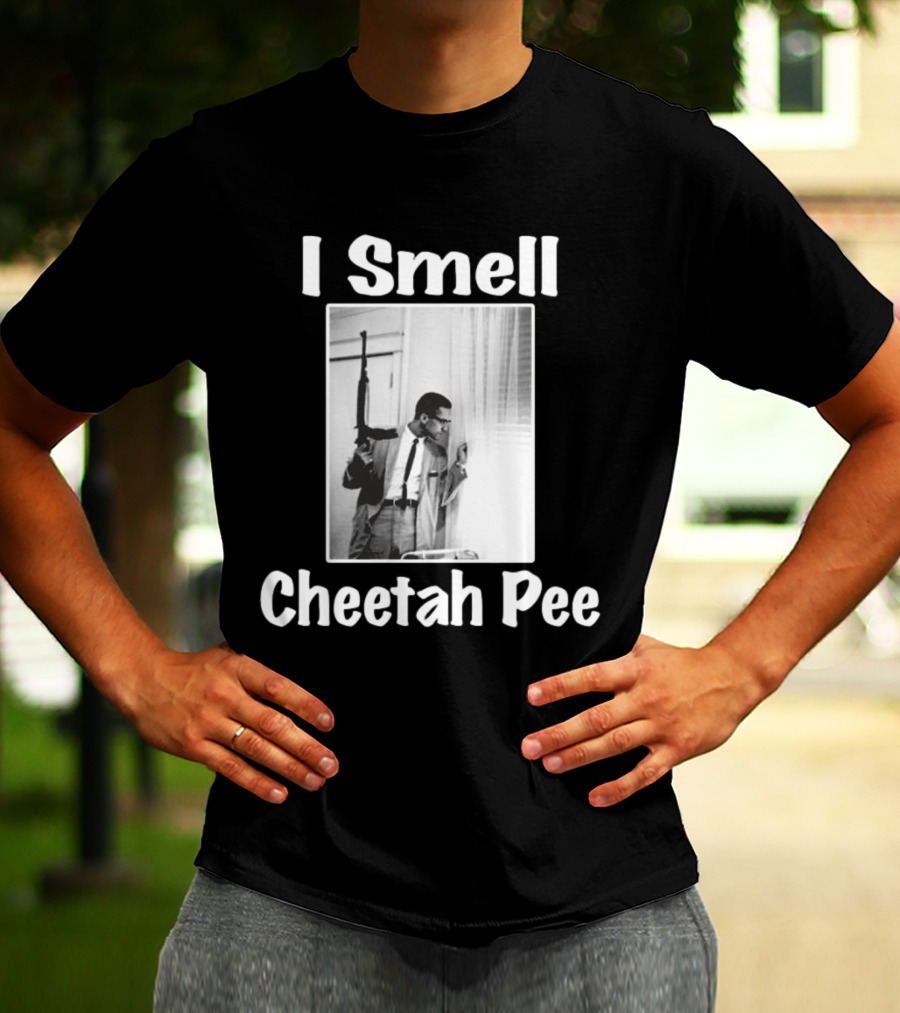 I Smell Cheetah Pee Man Holding Gun By Window T-Shirt