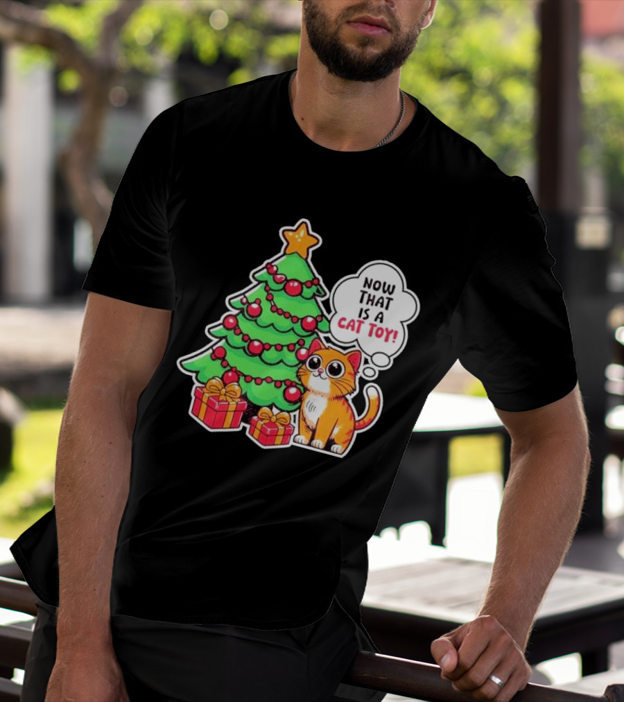 Now That Is A Cat Toy A Cute Orange Cat With Wide Eyes Next To Decorated Christmas Tree T-Shirt