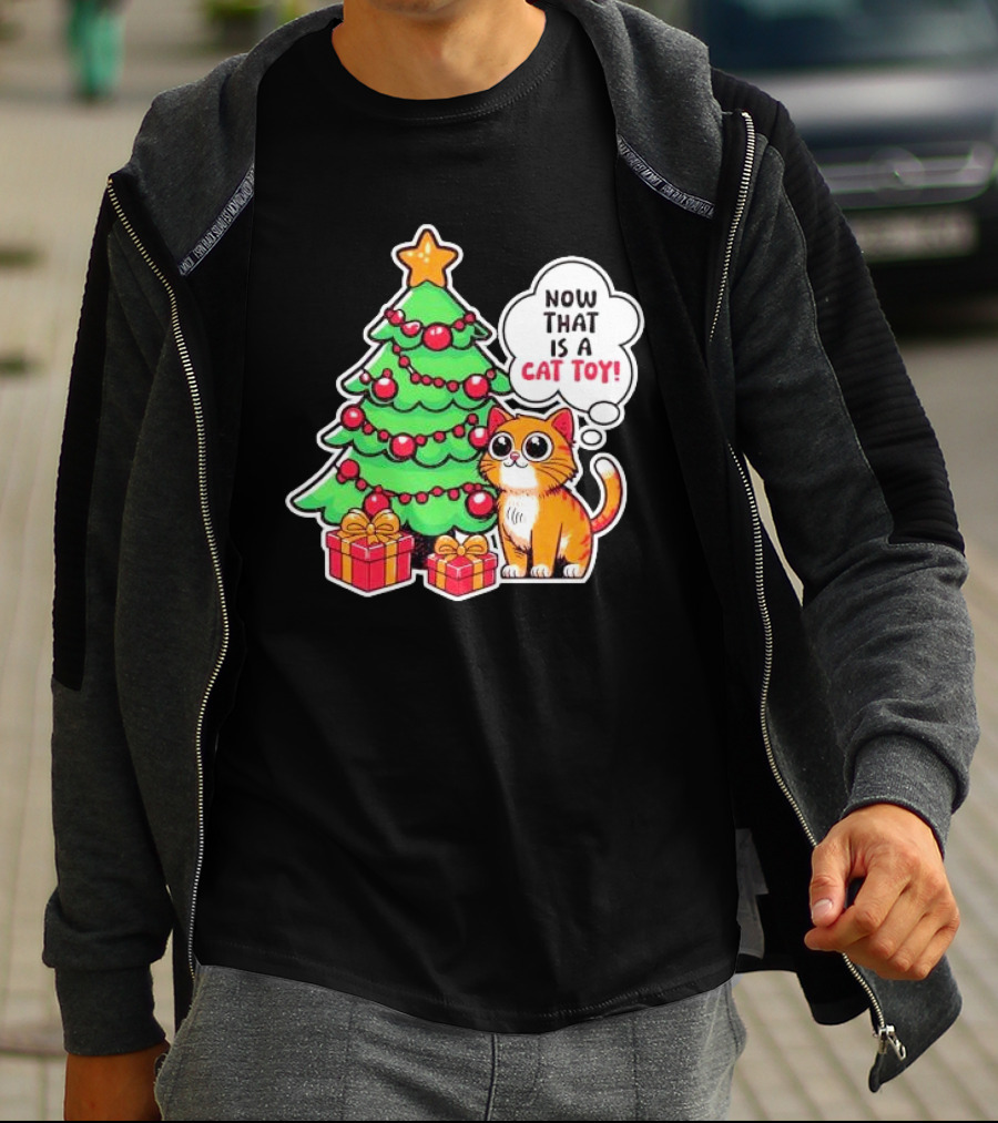Now That Is A Cat Toy A Cute Orange Cat With Wide Eyes Next To Decorated Christmas Tree T-Shirt