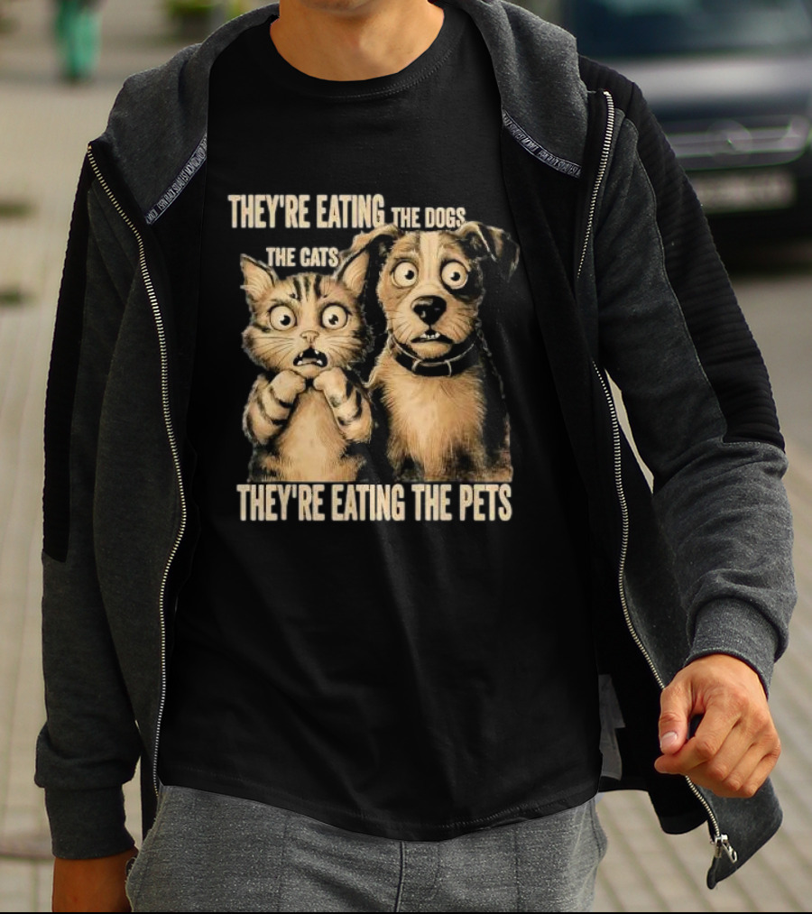 THEY'RE EATING THE DOGS THE CATS THEY'RE EATING THE PETS T-Shirt