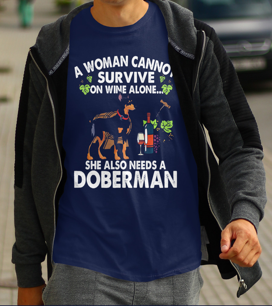 A Woman Cannot Survive On Wine Alone She Also Needs A Doberman T-Shirt