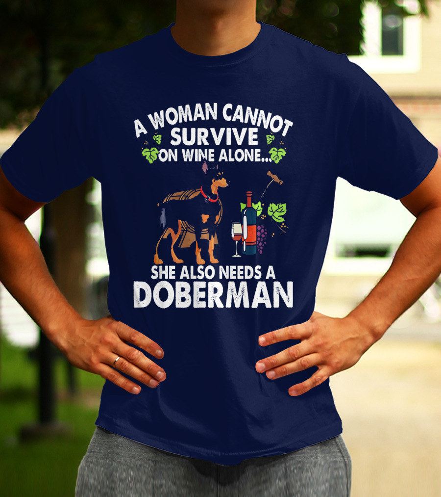 A Woman Cannot Survive On Wine Alone She Also Needs A Doberman T-Shirt