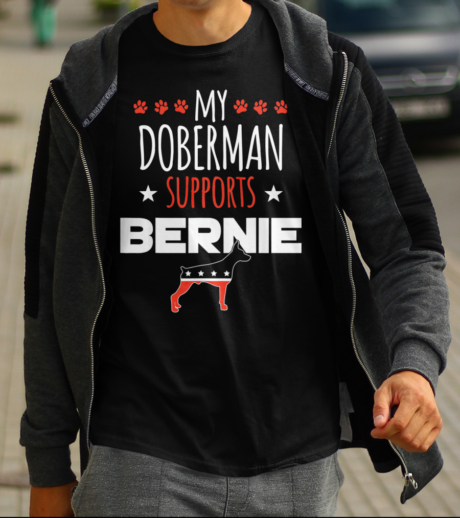 My Doberman Supports Bernie With Red White Blue Stars And Dog Paw Prints T-Shirt