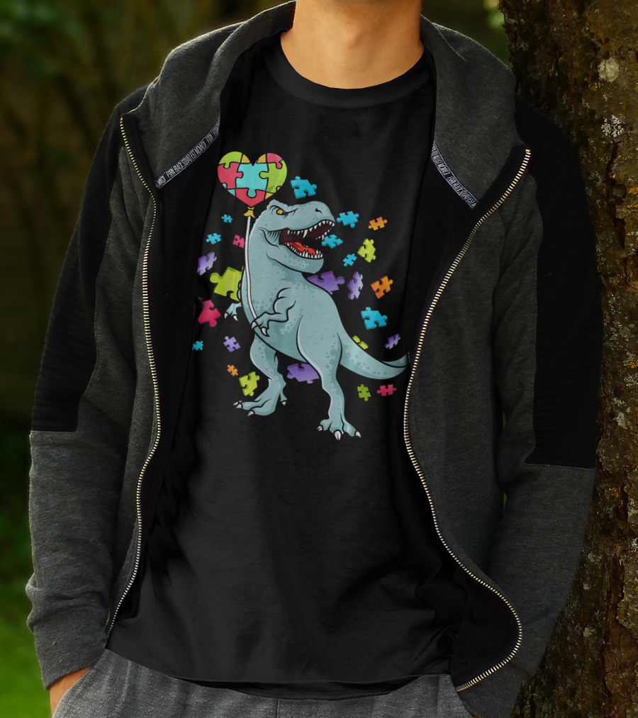 Autism Awareness Dinosaur With Puzzle Heart Balloon And Colorful Puzzle Pieces T-Shirt