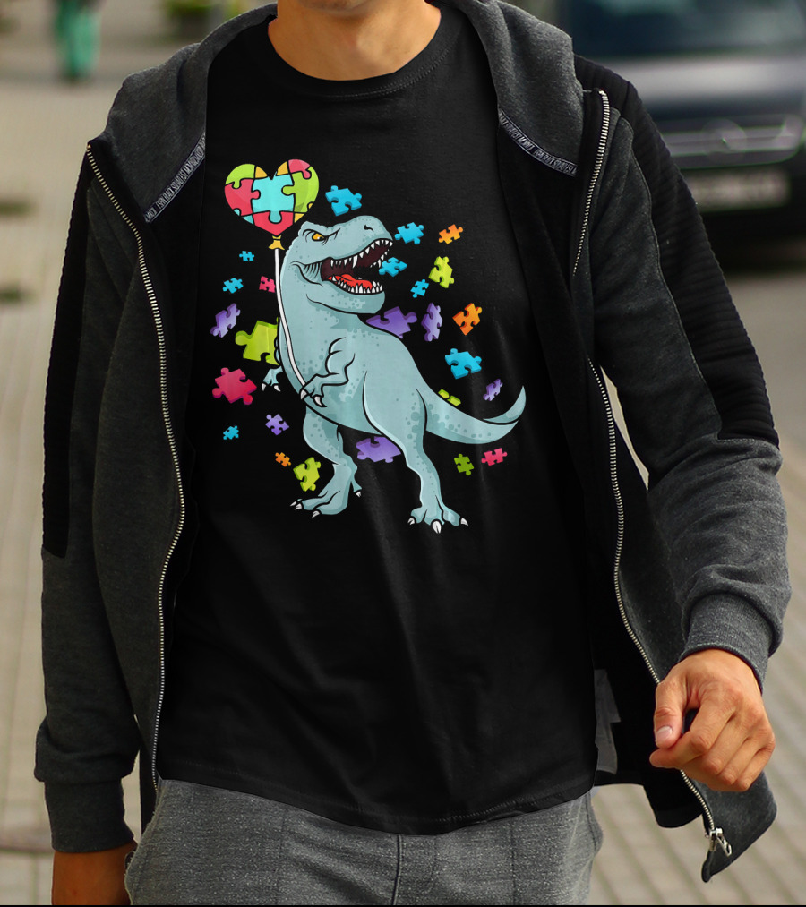 Autism Awareness Dinosaur With Puzzle Heart Balloon And Colorful Puzzle Pieces T-Shirt
