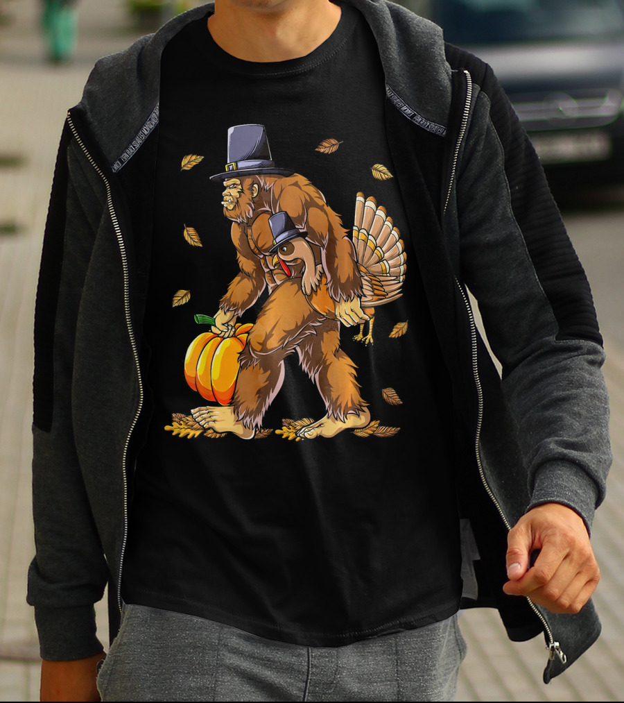 Bigfoot Pilgrim Turkey Carrying Pumpkin Thanksgiving T-Shirt