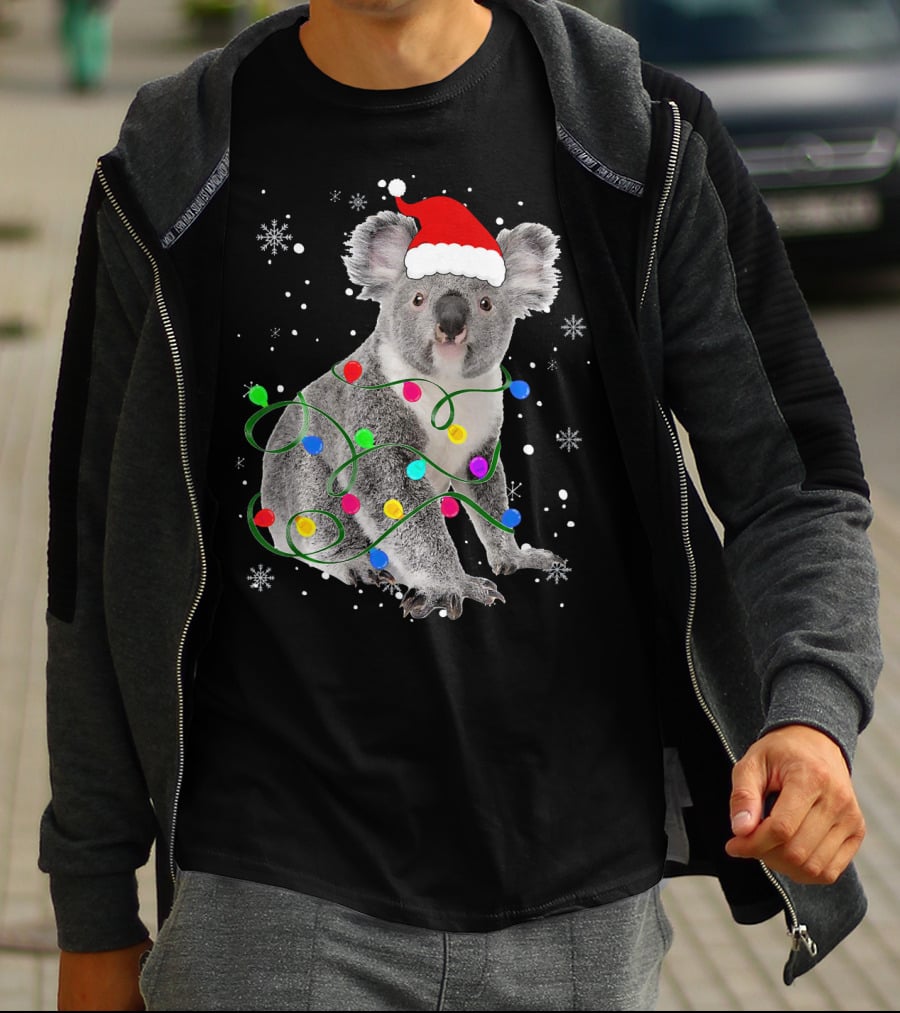 Koala Wrapped In Christmas Lights Wearing Santa Hat With Snowflakes Matching Fam T-Shirt
