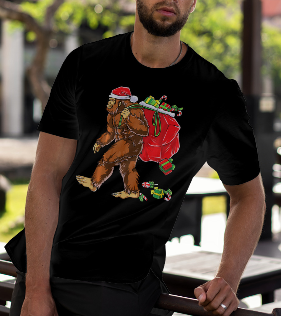 Bigfoot Santa Carrying Gifts With Candy Canes T-Shirt