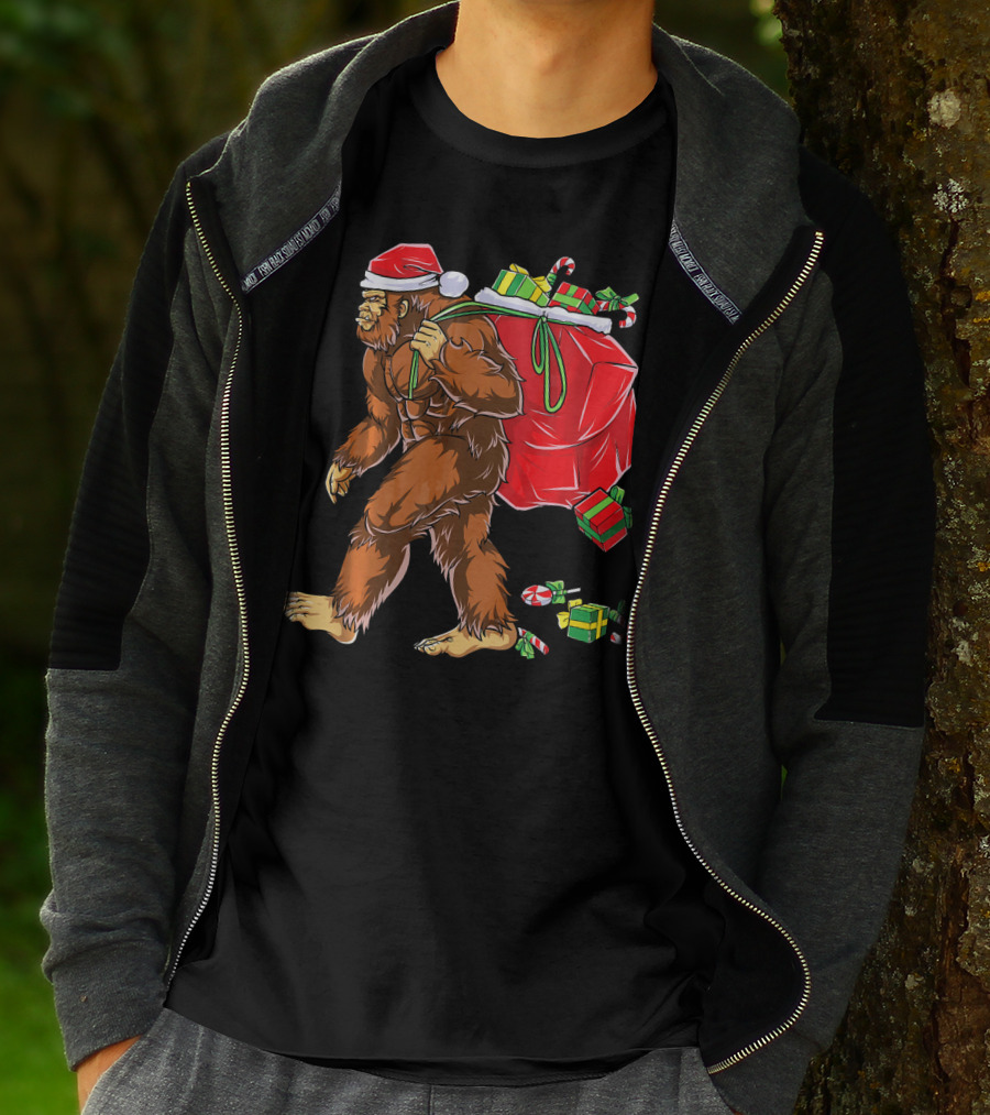 Bigfoot Santa Carrying Gifts With Candy Canes T-Shirt