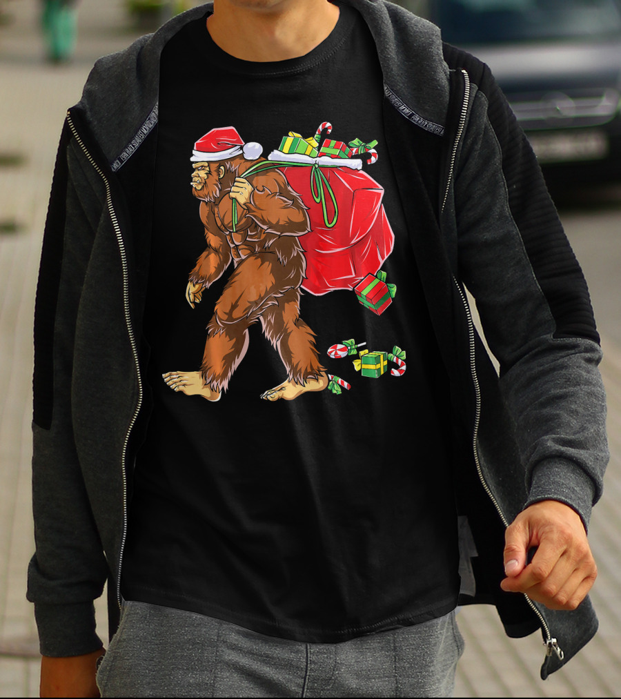 Bigfoot Santa Carrying Gifts With Candy Canes T-Shirt