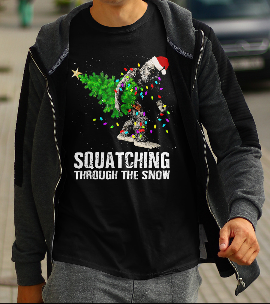 Squatching Through The Snow Bigfoot Christmas Lights Santa Hat T-Shirt