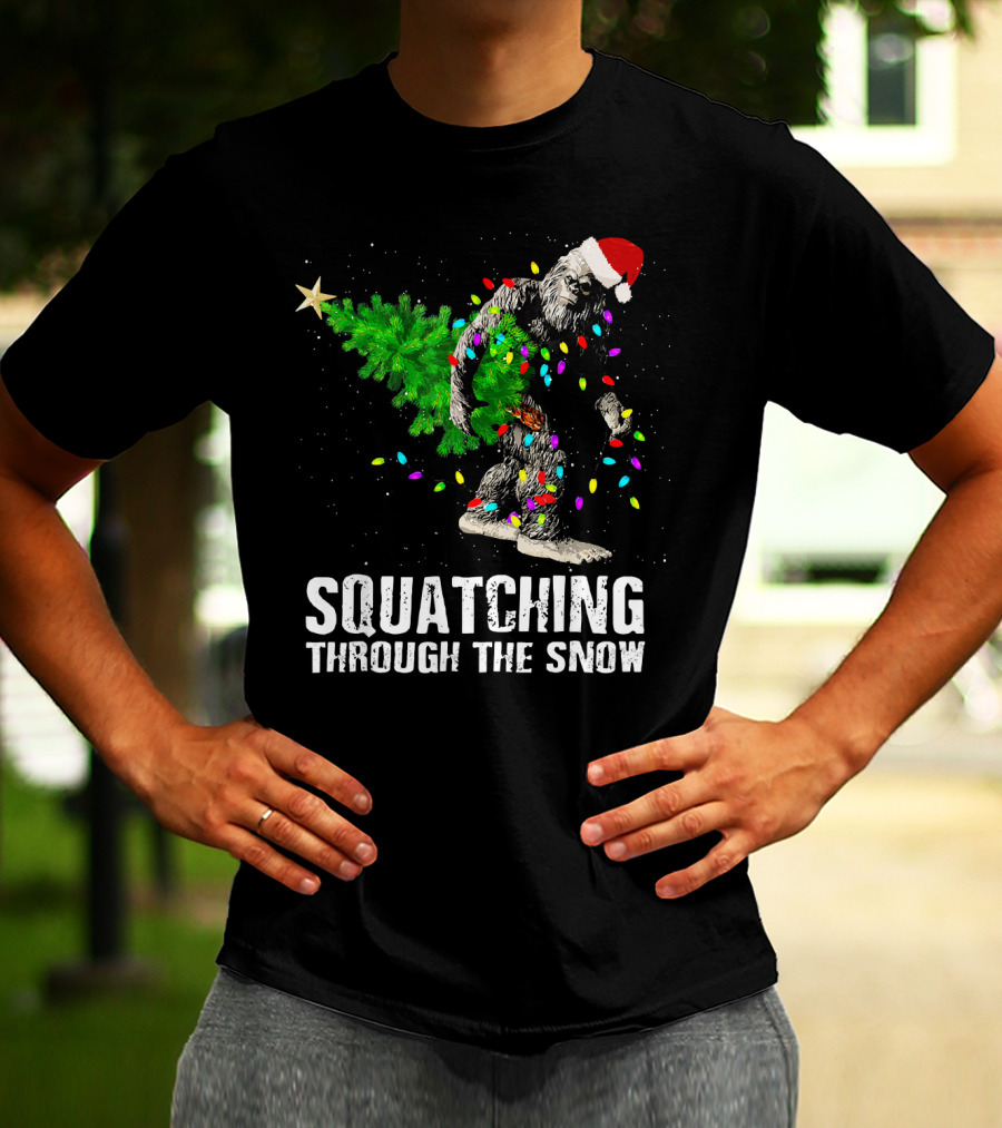 Squatching Through The Snow Bigfoot Christmas Lights Santa Hat T-Shirt