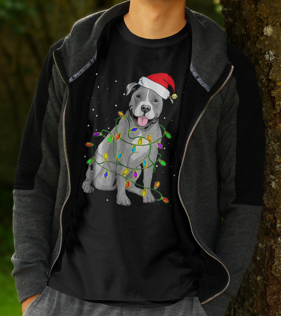 Pitbull In Santa Hat Wrapped In Christmas Lights With Snowy Background T-Shirt