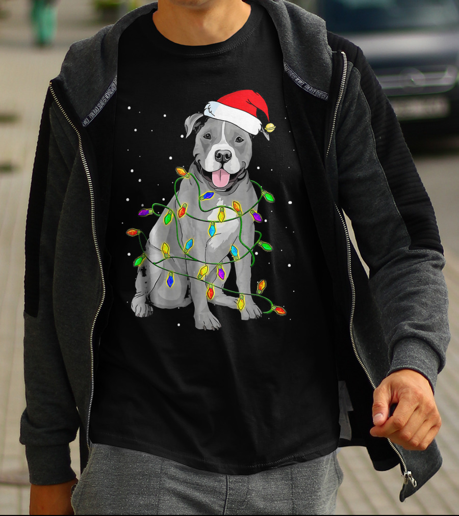 Pitbull In Santa Hat Wrapped In Christmas Lights With Snowy Background T-Shirt