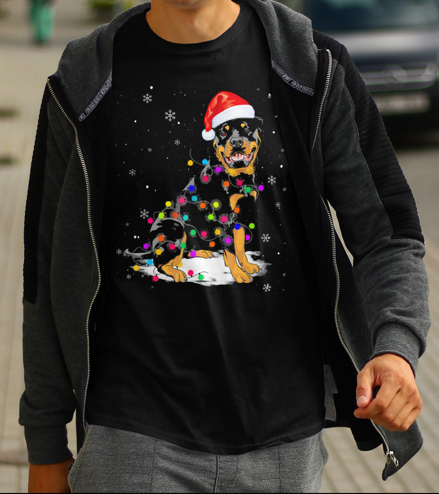 Rottweiler With Santa Hat And Colorful Christmas Lights In Snowy Scene T-Shirt