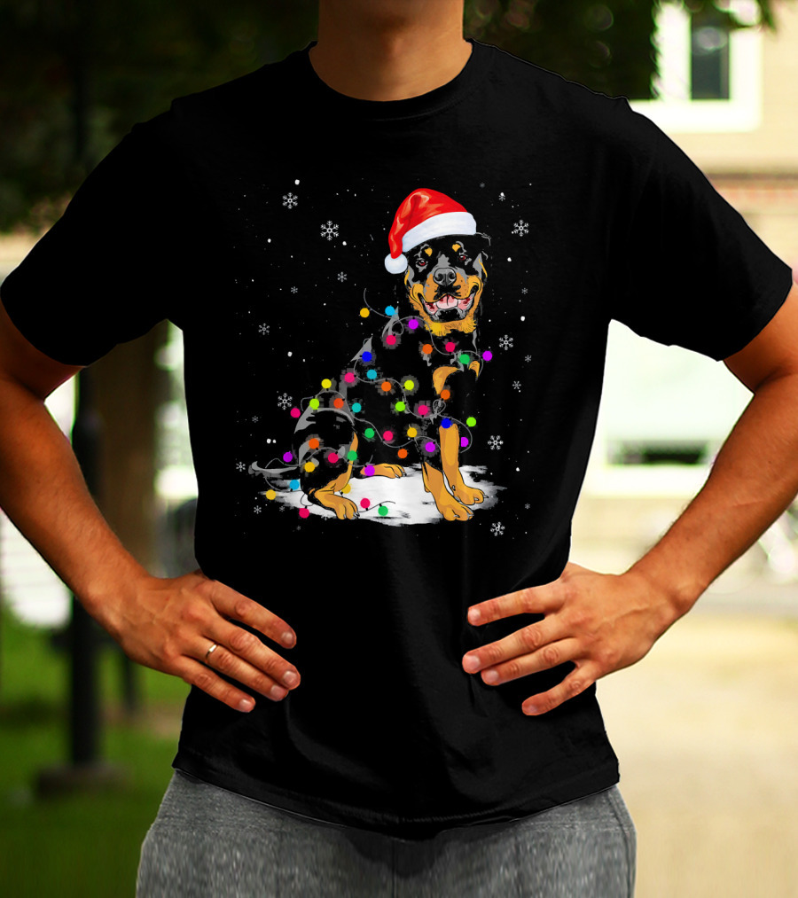 Rottweiler With Santa Hat And Colorful Christmas Lights In Snowy Scene T-Shirt