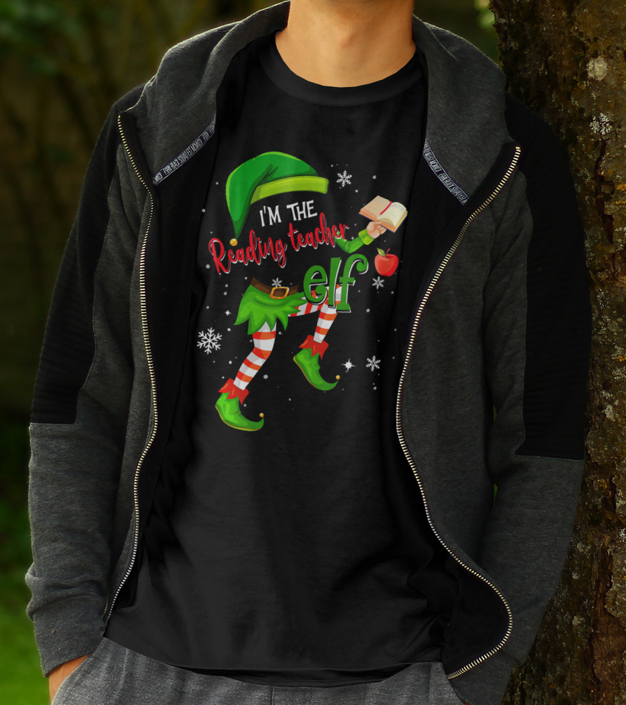 I'm The Reading Teacher Elf Holding Book Apple Wearing Elf Outfit Snowflakes T-Shirt