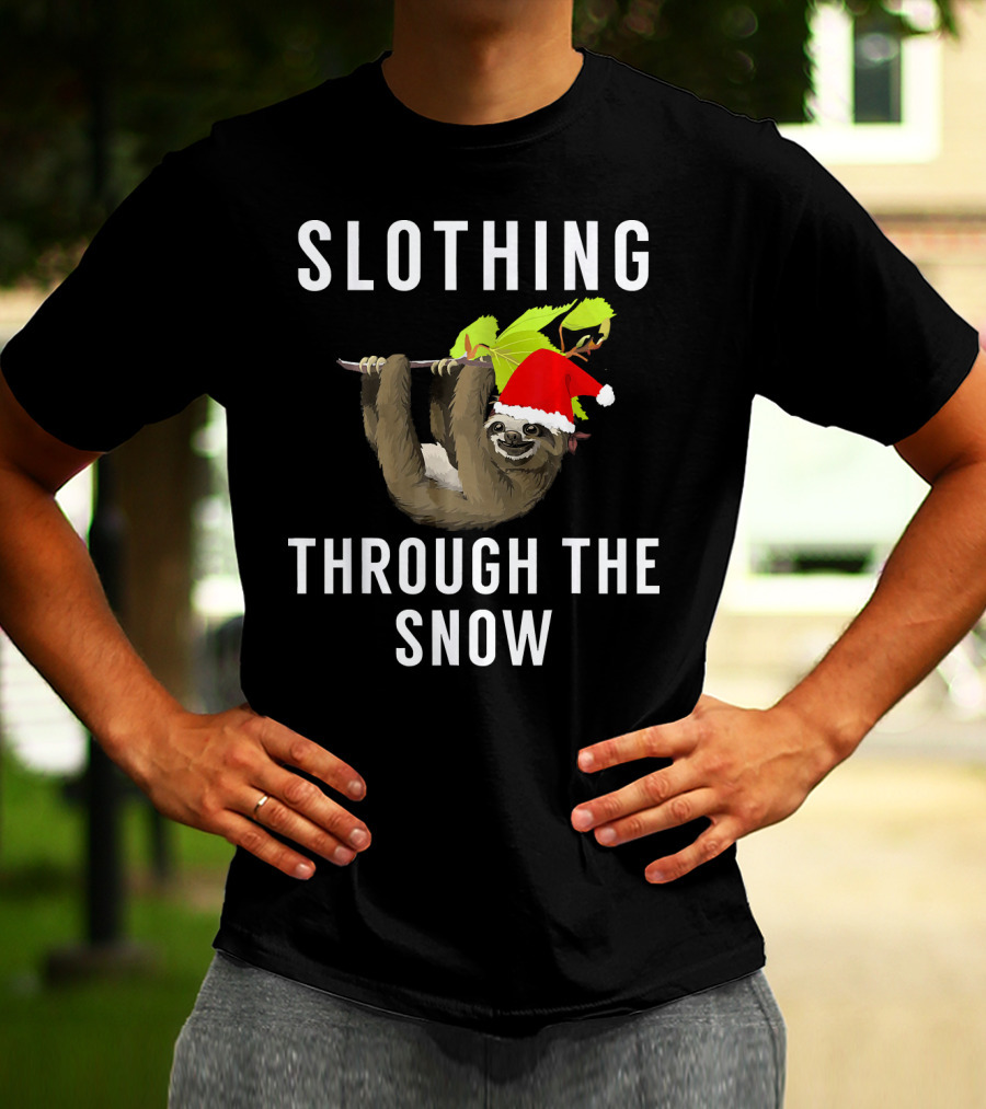 Sloth Wearing Santa Hat Hanging On Branch With Slothing Through The Snow T-Shirt